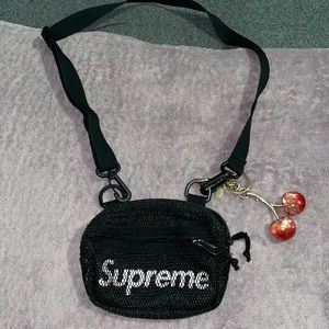 I’m selling a small black Crossbody supreme bag